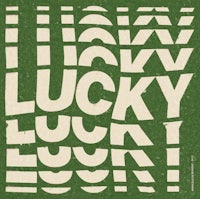 a green and white poster with the word lucky on it