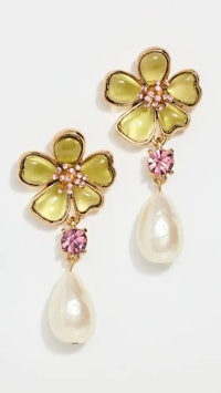 a pair of yellow and pink flower earrings with pearls